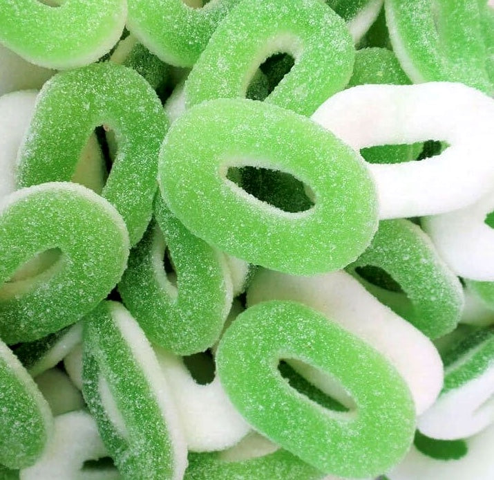 Sour rings different flavors (cola, strawberry, apple, raspberry) per 100g